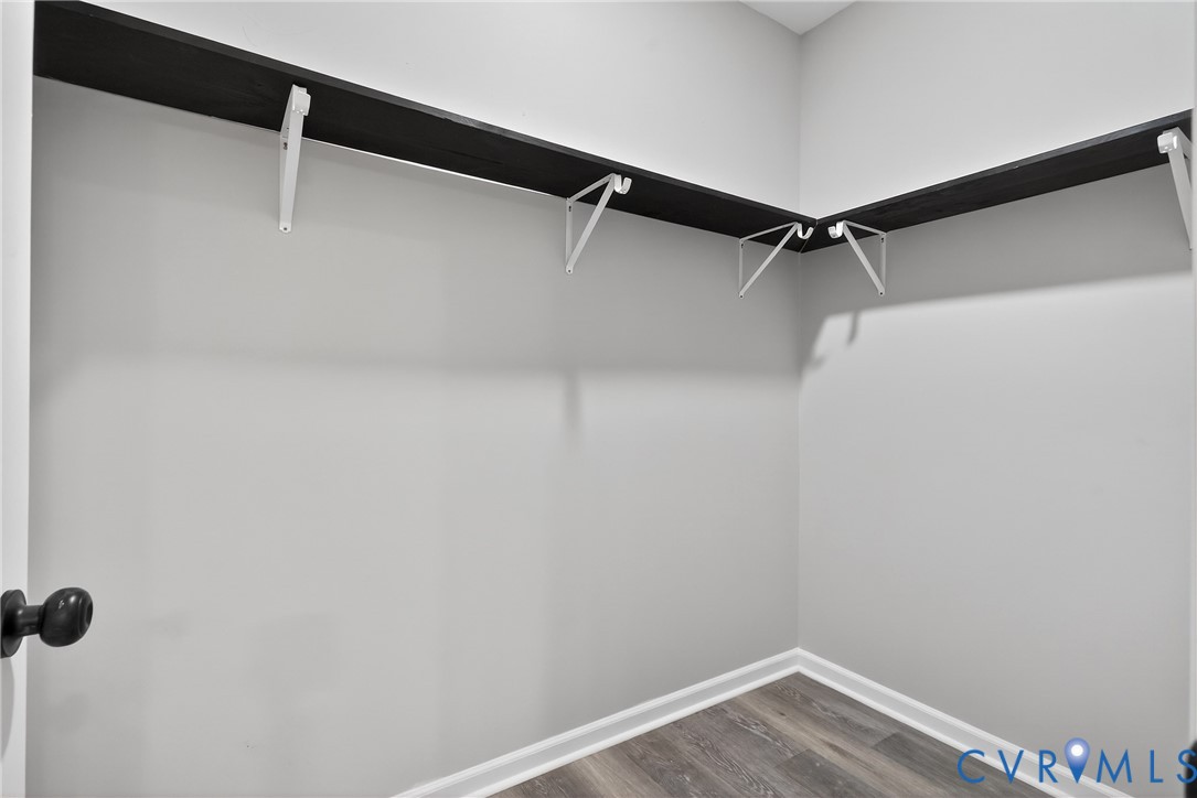 1952 Powell Road Richmond, VA 23224 - Photo 19 of 36 a view of a room with racks on the wall