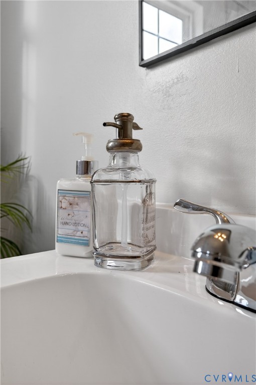 1952 Powell Road Richmond, VA 23224 - Photo 28 of 36 a kitchen with a sink and cabinets