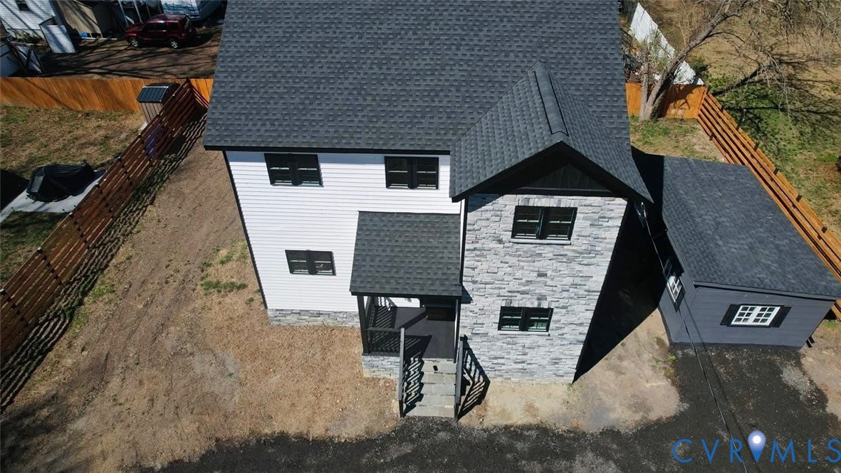 1952 Powell Road Richmond, VA 23224 - Photo 35 of 36 a front view of a house with glass door