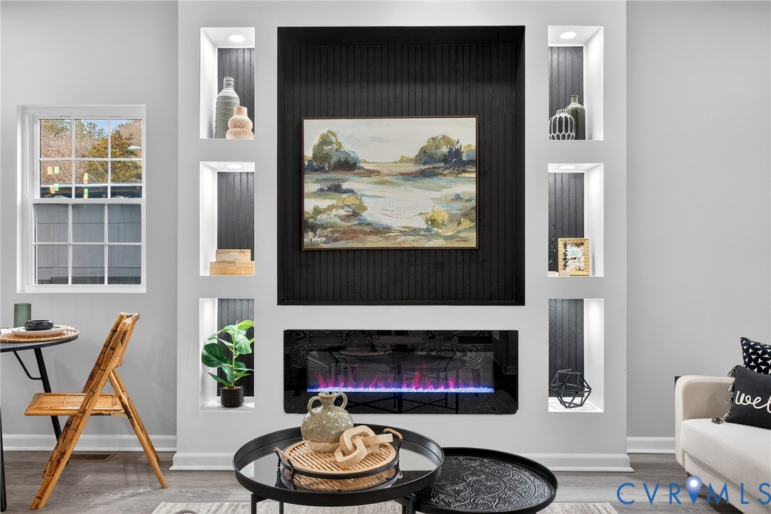 1952 Powell Road Richmond, VA 23224 - Photo 8 of 36 a living room with furniture and a fireplace