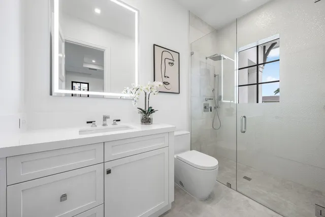 a view of swimming pool with a patio and a garden