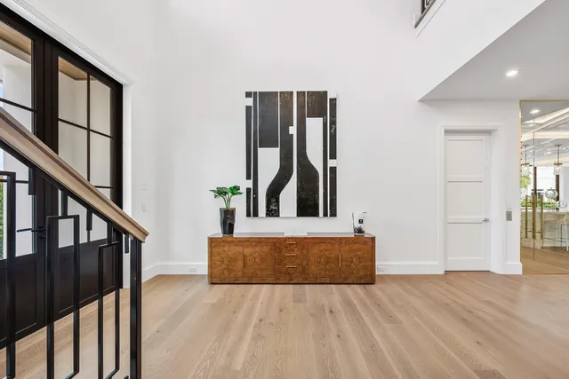 a living room with fireplace furniture and a flat screen tv