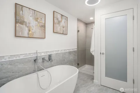 a close view of a utility room with washer and dryer