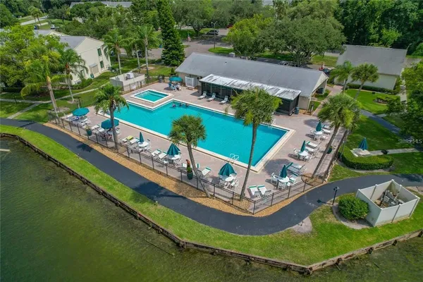 an aerial view of a house with a garden and outdoor space
