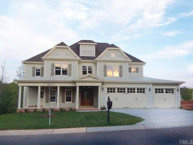 12504 Angel Road Raleigh, NC 27606 - Photo 1 of 8 Custom built, custom-designed home by HCH Custom Homes backing to a natural area that will never be built upon. One of the largest sites available in Glenstone, and great unfinsihed walk-out basement level. Exterior Front