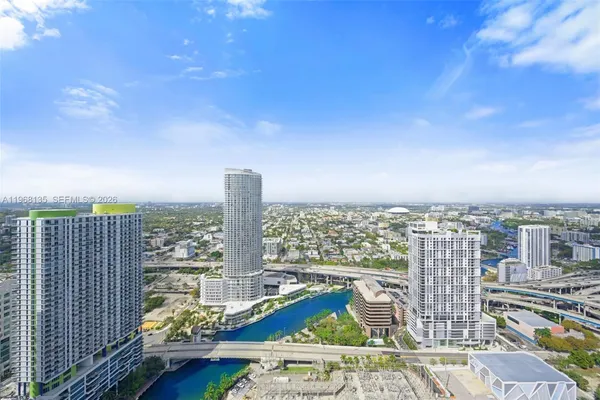 a view of a city with tall buildings