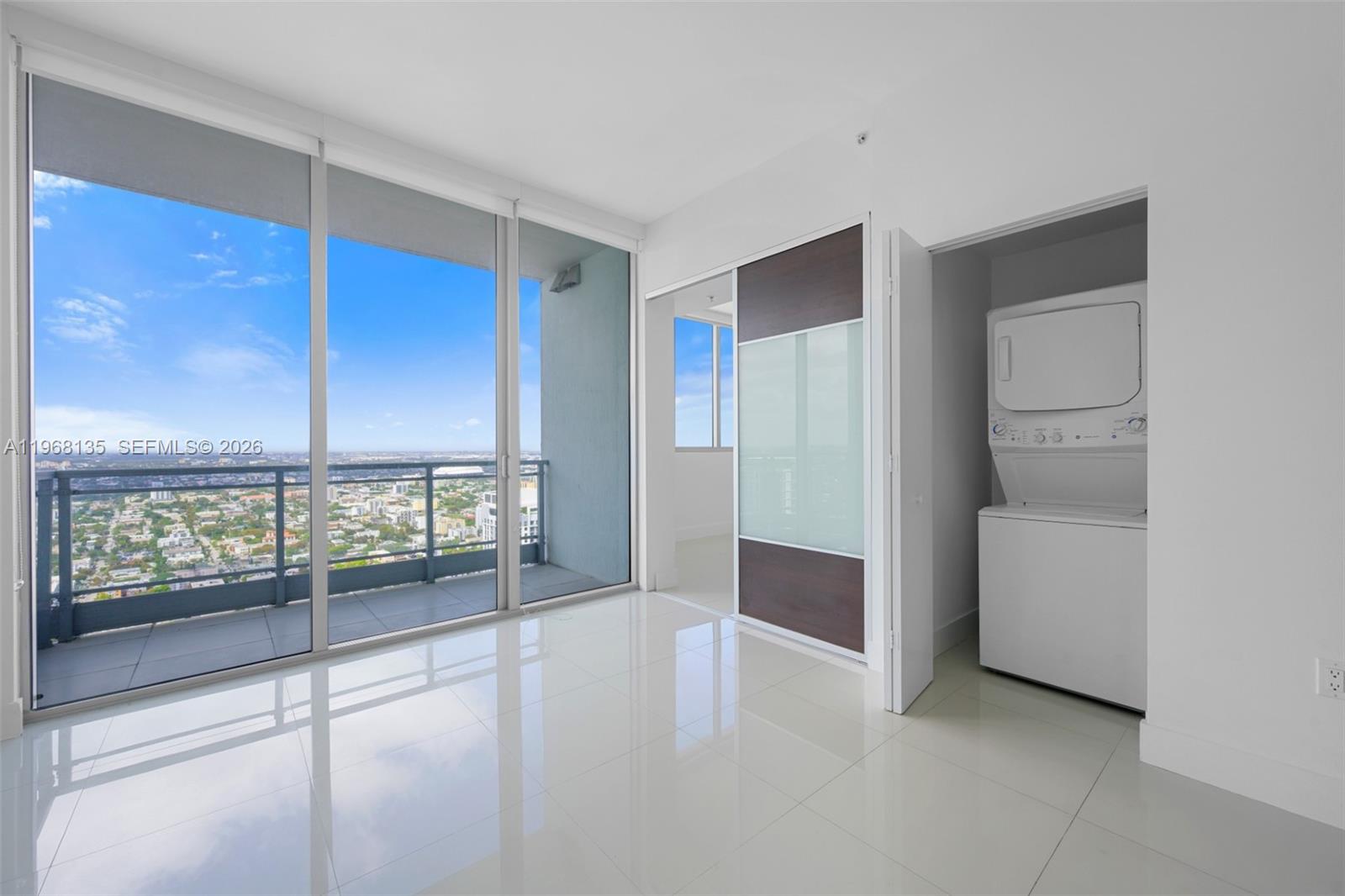 92 Southwest 3rd Street, Unit 5109 Miami, FL 33130 - Photo 5 of 27 a view of an empty room with a window