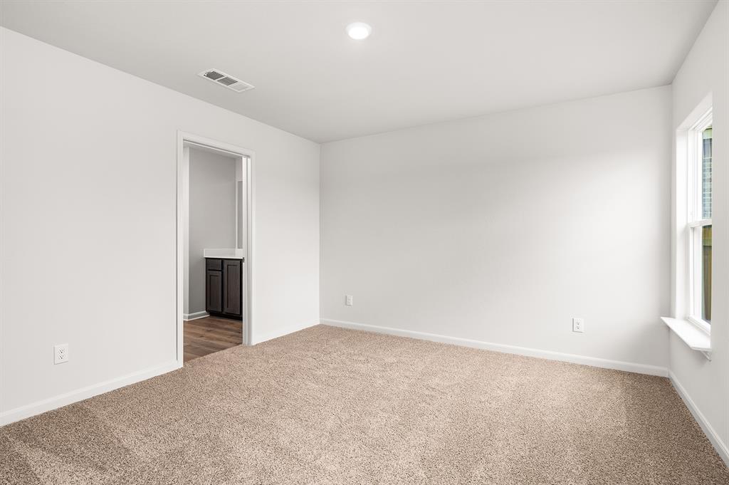 307 Patton Lane Venus, TX 76084 - Photo 5 of 8 an empty room with windows