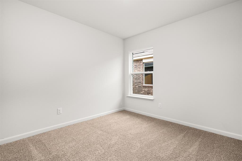 307 Patton Lane Venus, TX 76084 - Photo 7 of 8 an empty room with windows