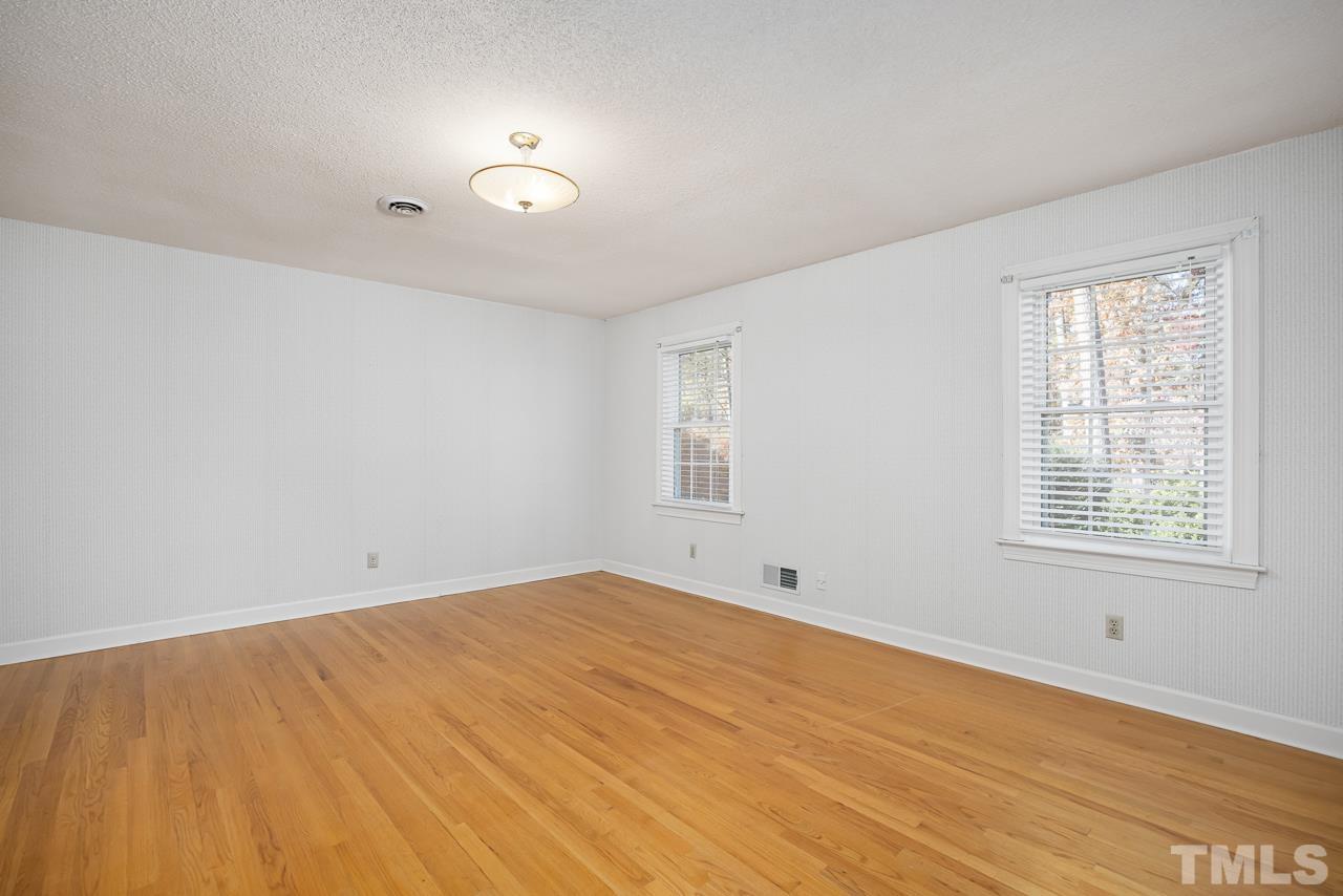 3100 Braddock Drive Raleigh, NC 27612 - Photo 14 of 40 an empty room with a window