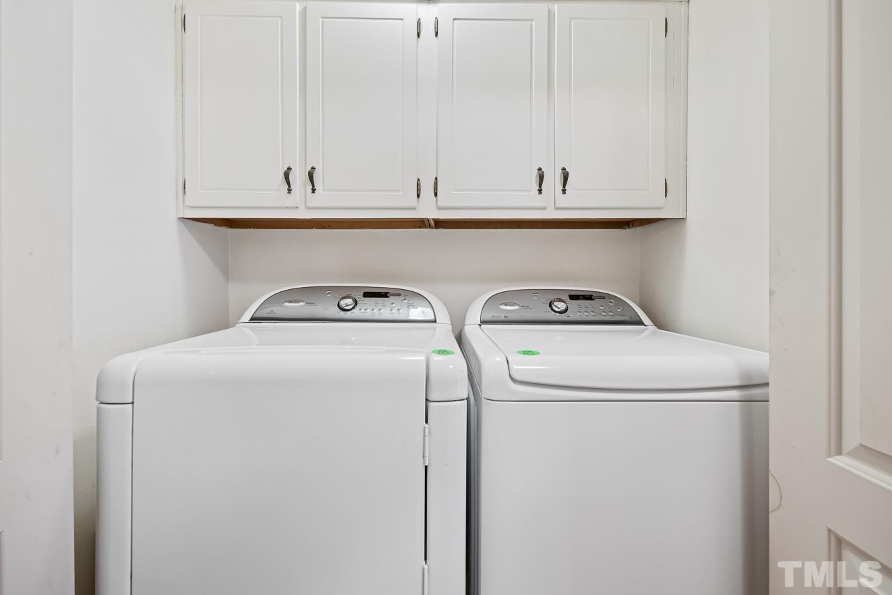 3100 Braddock Drive Raleigh, NC 27612 - Photo 15 of 40 a utility room with dryer and washer
