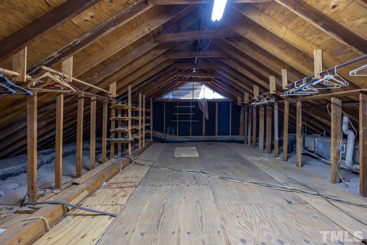 3100 Braddock Drive Raleigh, NC 27612 - Photo 27 of 40 a view of an empty room with wooden walls