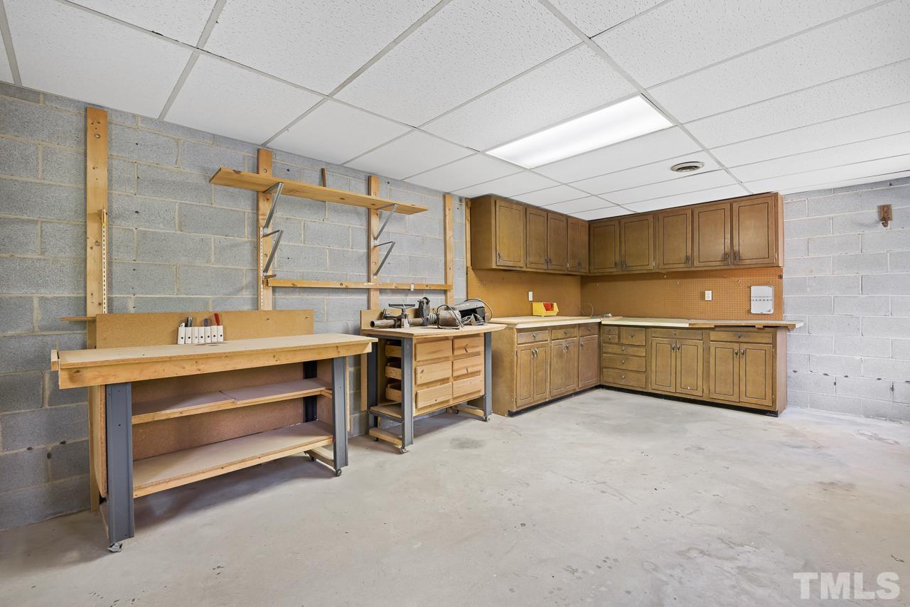 3100 Braddock Drive Raleigh, NC 27612 - Photo 29 of 40 a view of a kitchen with sink and cabinet