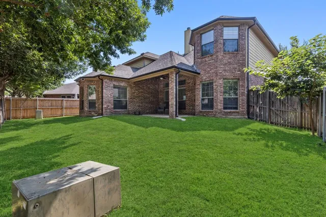 a view of a backyard with a garden