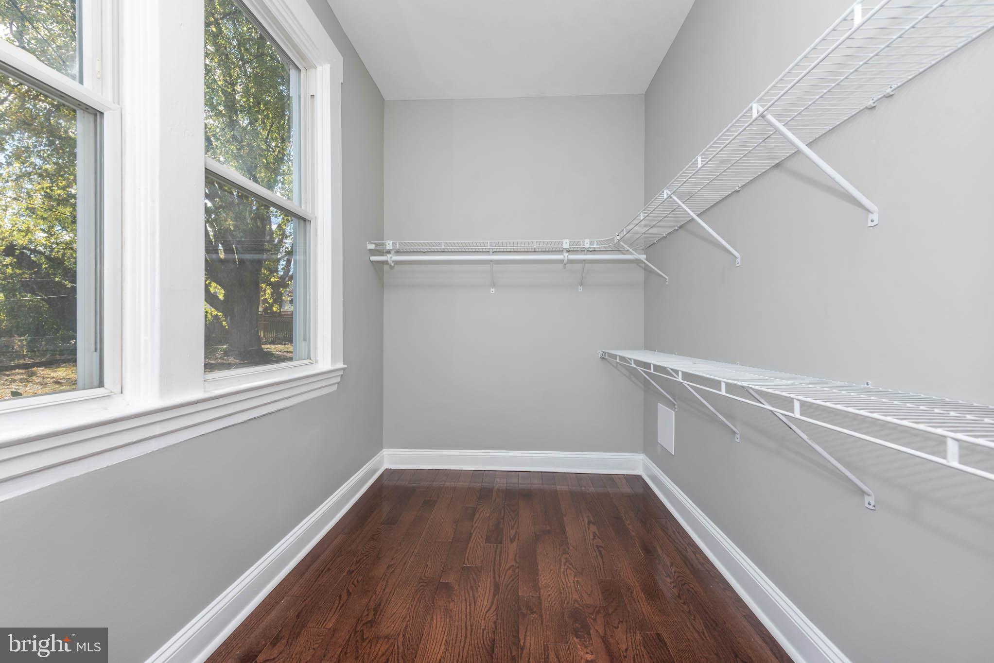 4001 Ridgecroft Road Baltimore, MD 21206 - Photo 13 of 35 a view of a room with wooden floor and windows
