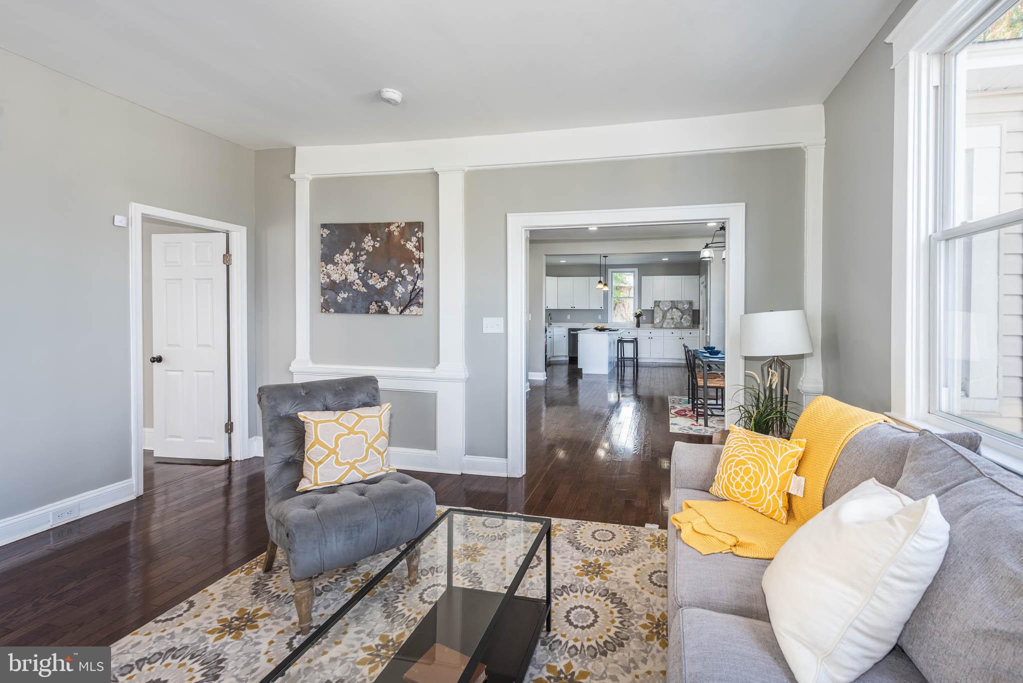 4001 Ridgecroft Road Baltimore, MD 21206 - Photo 3 of 35 a living room with furniture and a large window