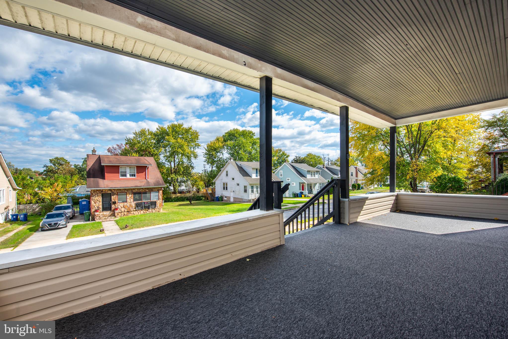 4001 Ridgecroft Road Baltimore, MD 21206 - Photo 32 of 35 a two chairs sitting in the middle of a building