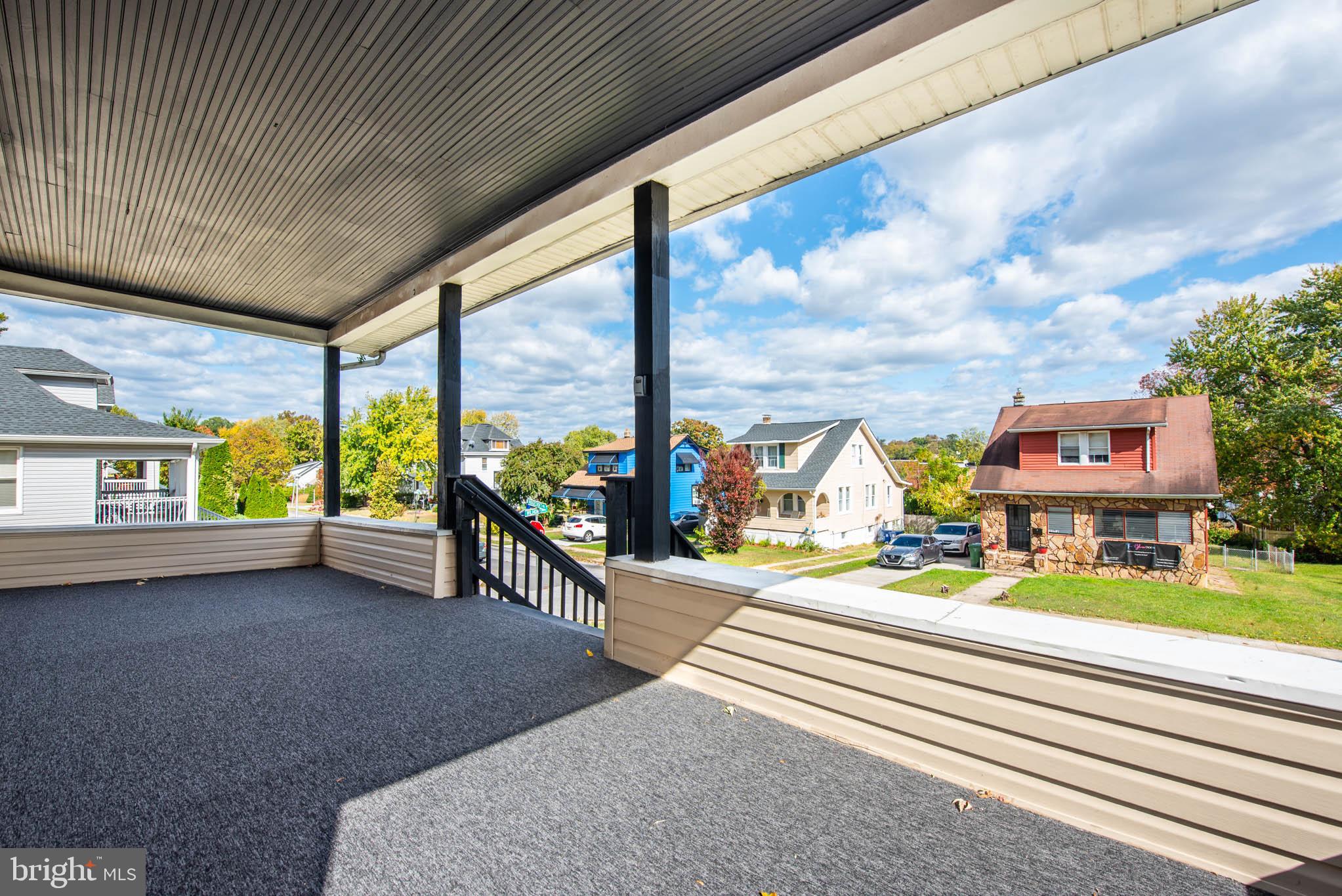 4001 Ridgecroft Road Baltimore, MD 21206 - Photo 33 of 35 a building outdoor space with patio furniture and a garden