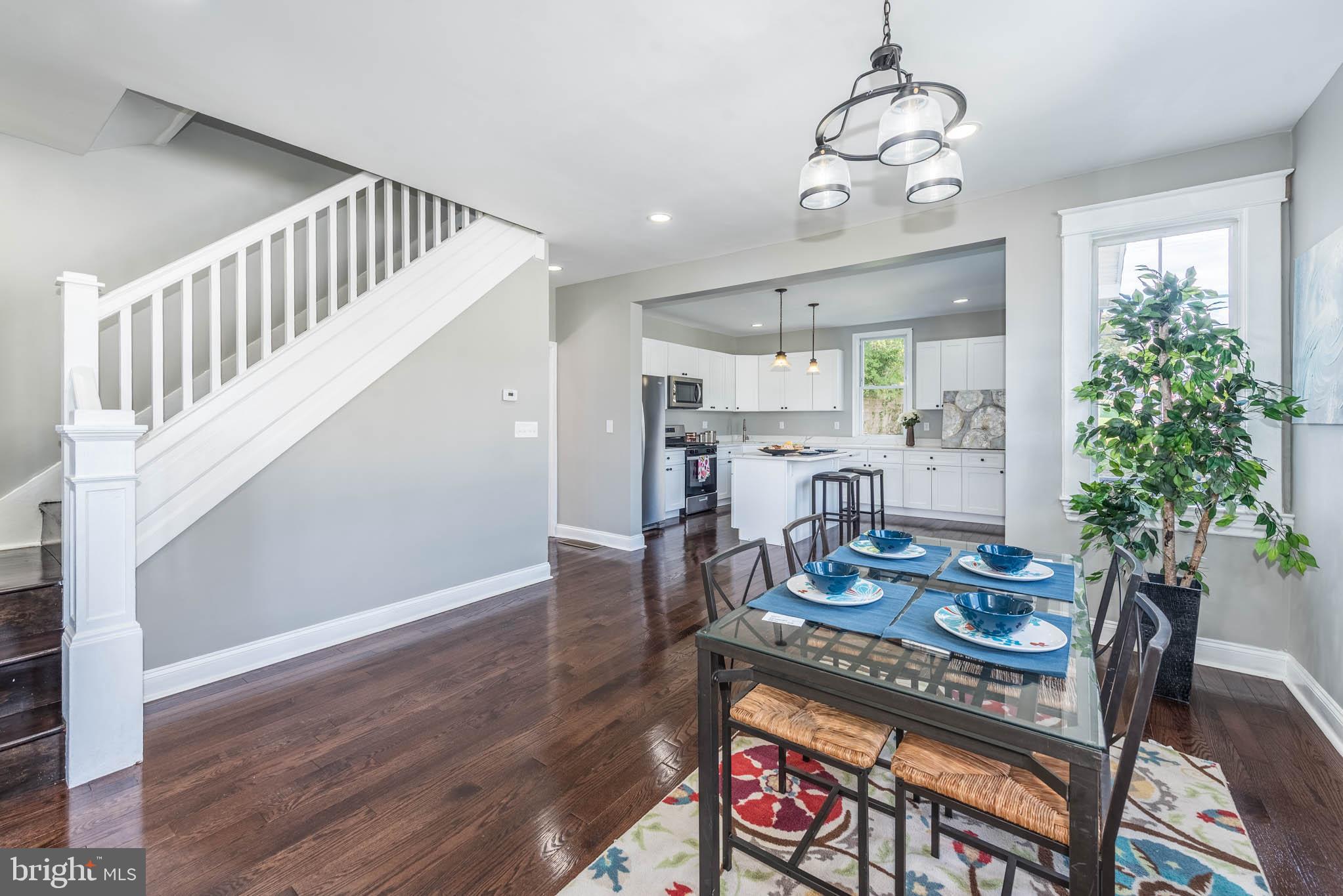 4001 Ridgecroft Road Baltimore, MD 21206 - Photo 5 of 35 a view of a dining room with furniture window and wooden floor