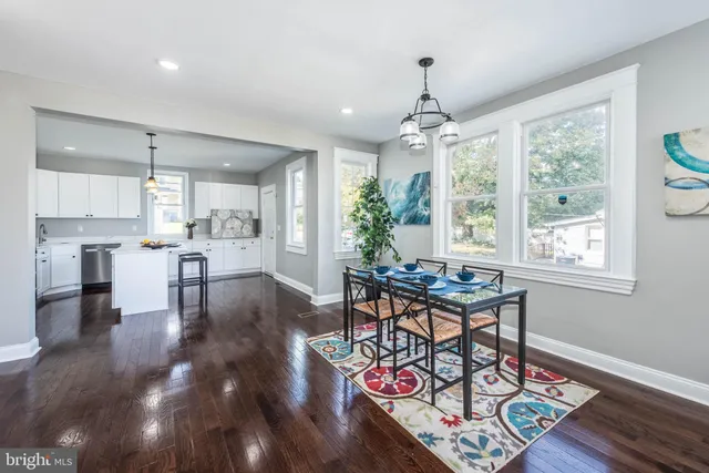 a dining room with furniture window wooden floor
