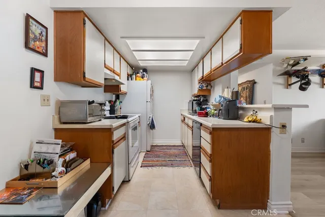 a living room with furniture window and wooden floor