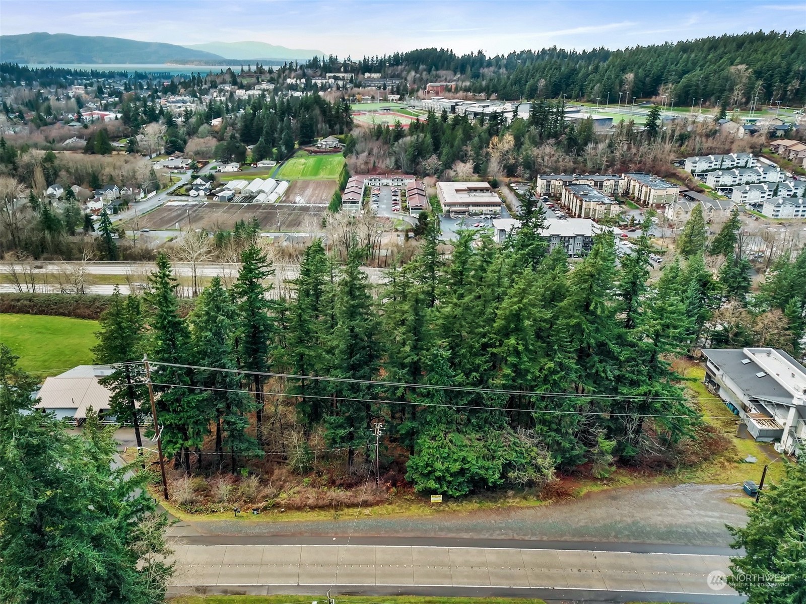 750-800 Samish Way Bellingham, WA 98229 - Photo 1 of 1 a view of a lake with houses
