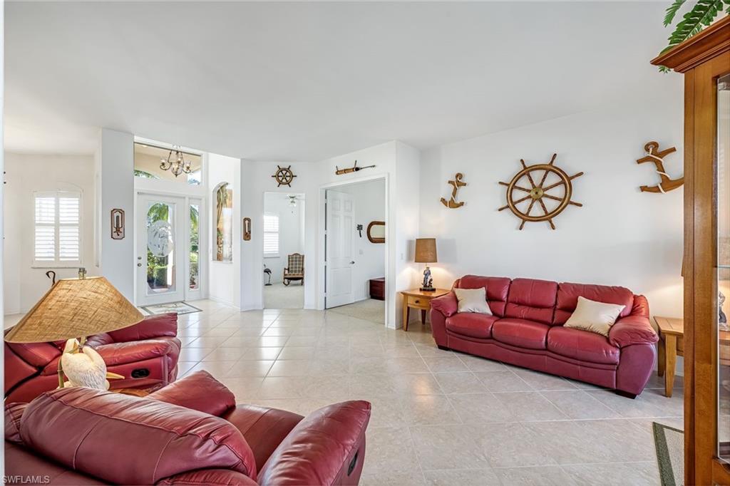 598 Grand Rapids Boulevard Naples, FL 34120 - Photo 16 of 49 entryway, and second living area, opens to screened lanai