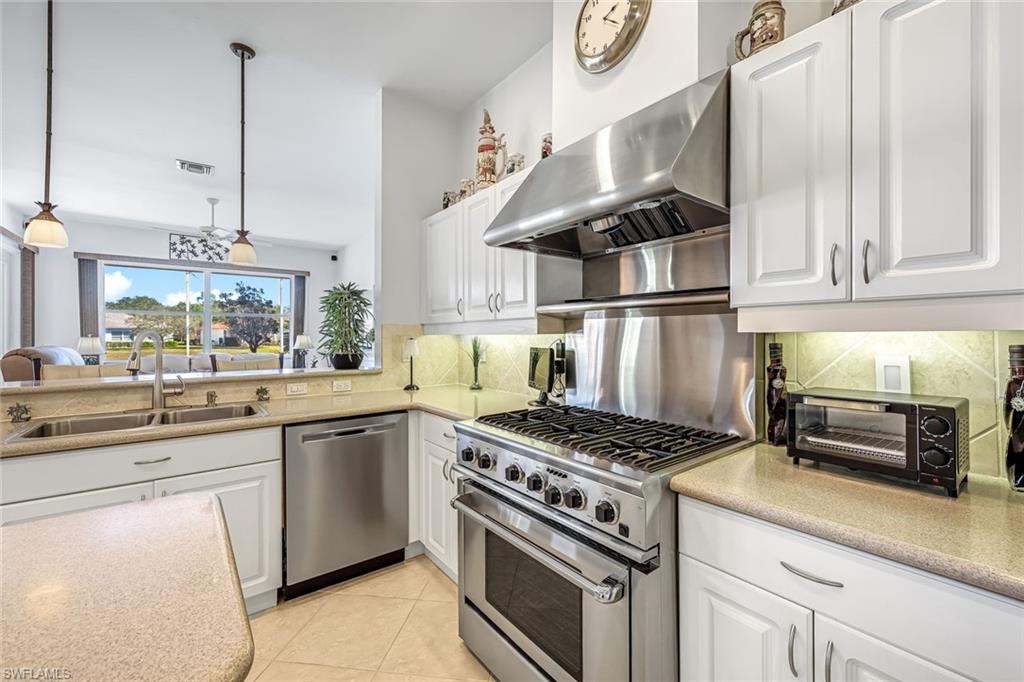598 Grand Rapids Boulevard Naples, FL 34120 - Photo 7 of 49 gas cooking here! Viking stove and oven with warming shelf and 6 burners