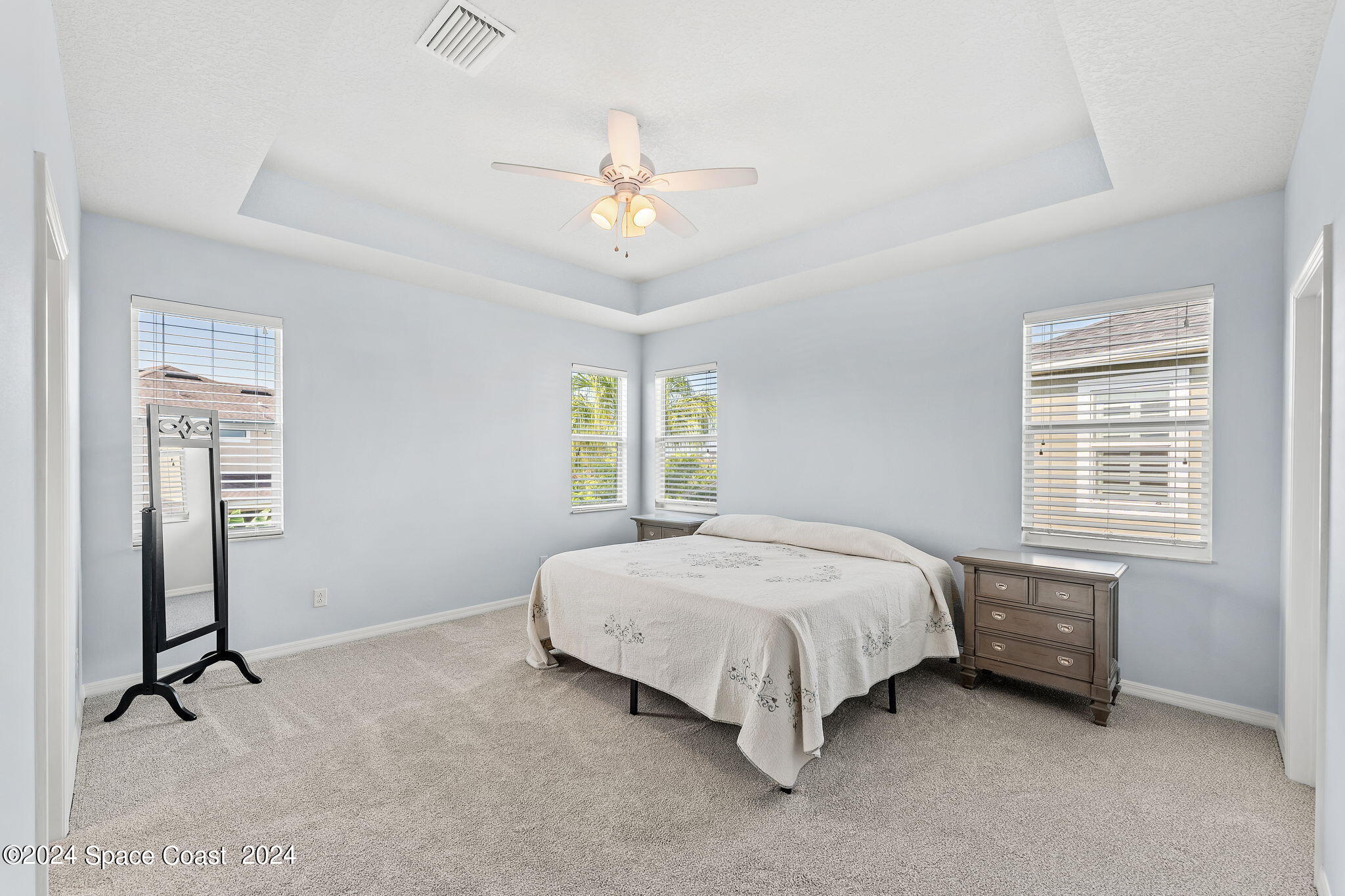 2850 Amethyst Way Melbourne, FL 32940 - Photo 13 of 37 a bedroom with a bed and a window