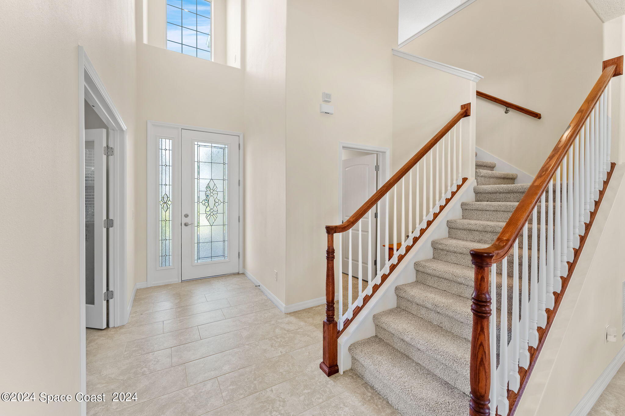 2850 Amethyst Way Melbourne, FL 32940 - Photo 2 of 37 a view of an entryway with staircase