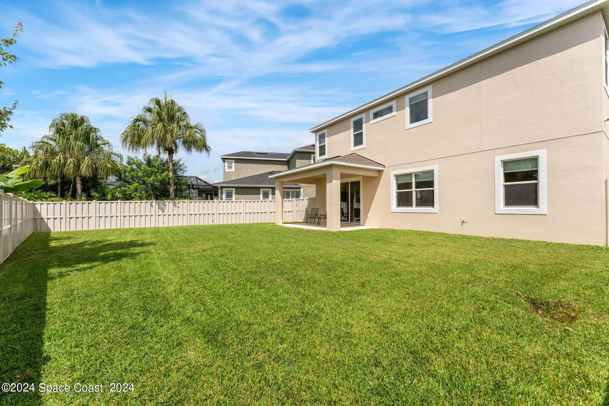 2850 Amethyst Way Melbourne, FL 32940 - Photo 25 of 37 a view of a yard with a house