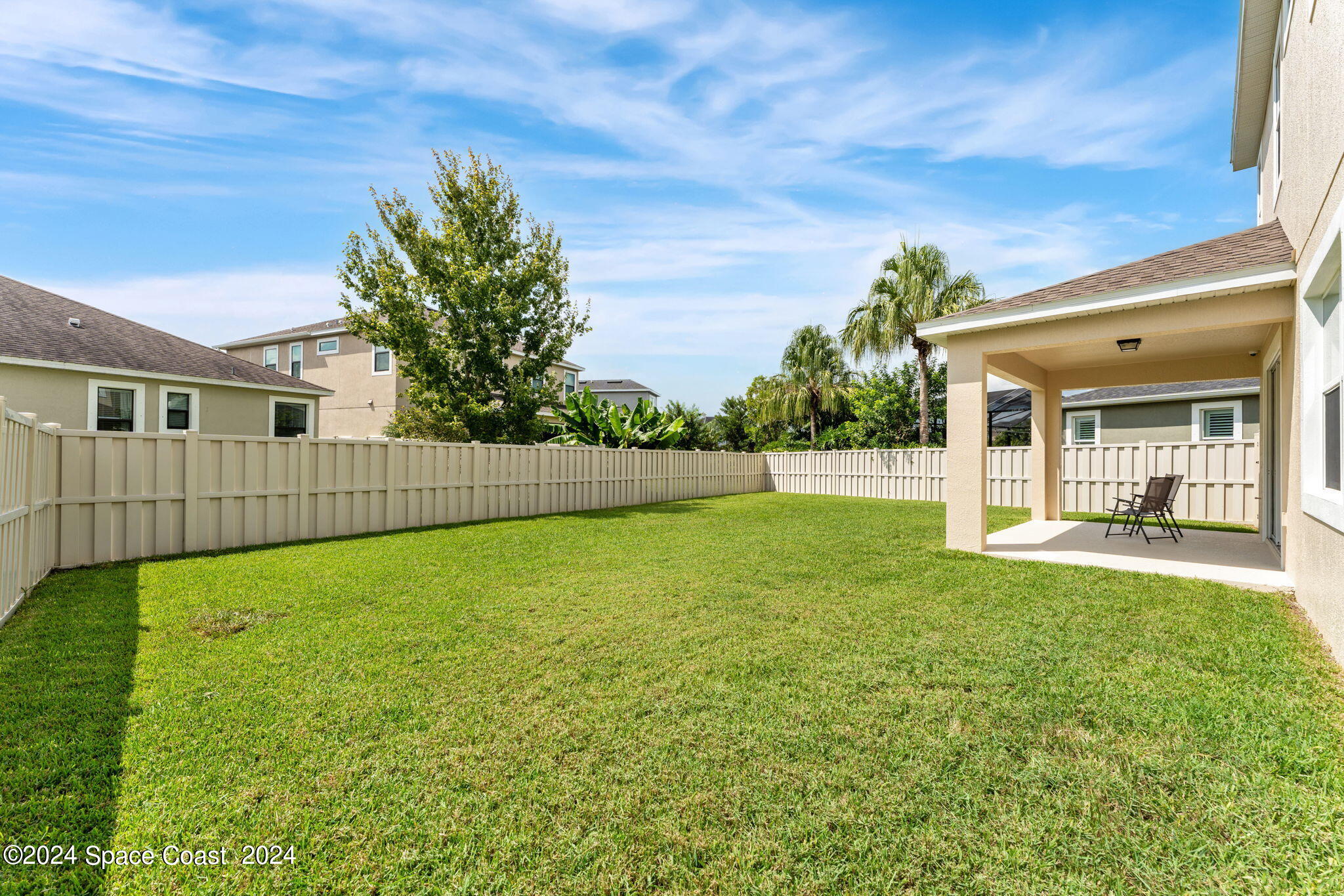 2850 Amethyst Way Melbourne, FL 32940 - Photo 26 of 37 a view of a house with backyard and porch