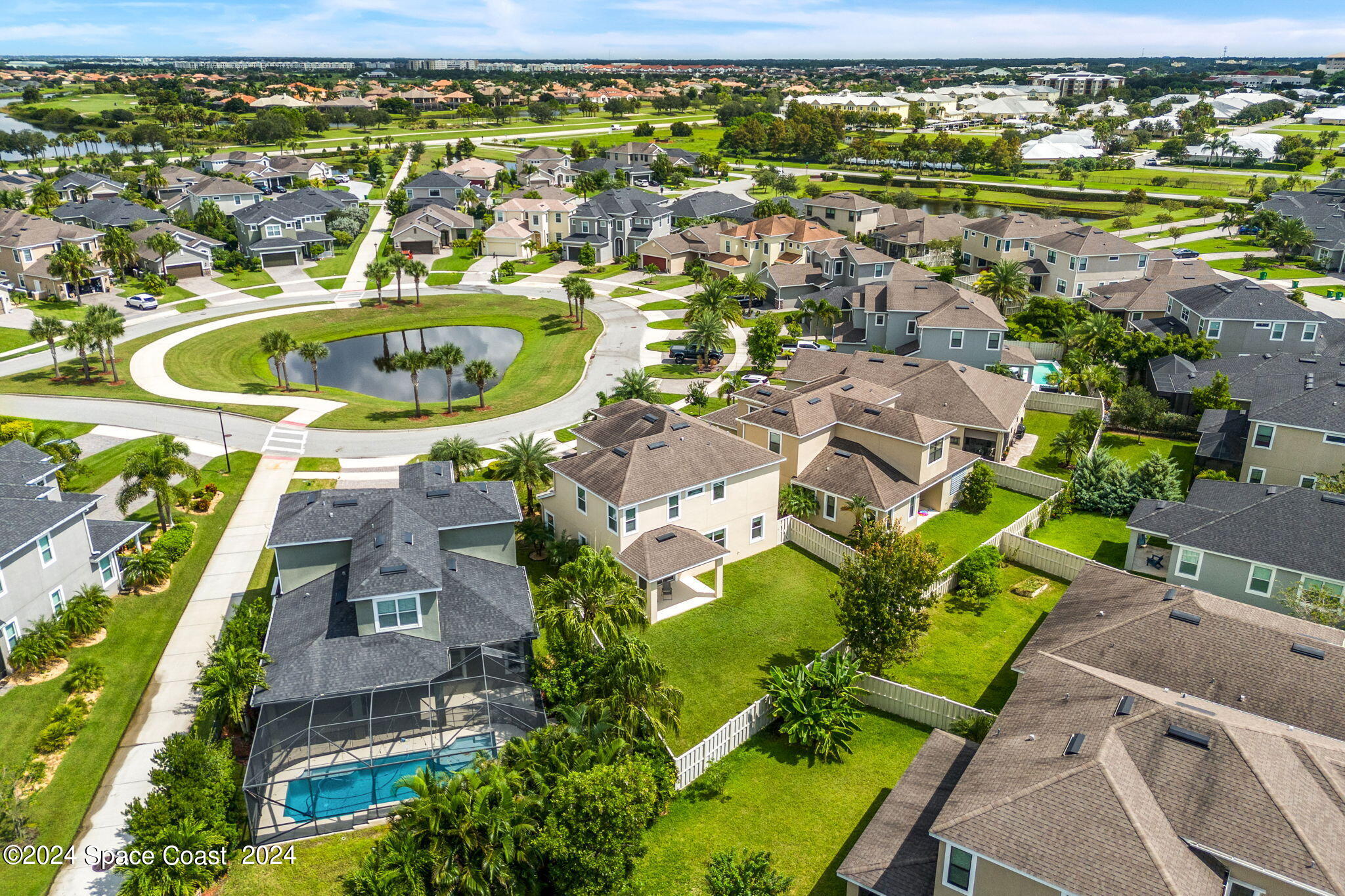2850 Amethyst Way Melbourne, FL 32940 - Photo 29 of 37 an aerial view of a house with a swimming pool