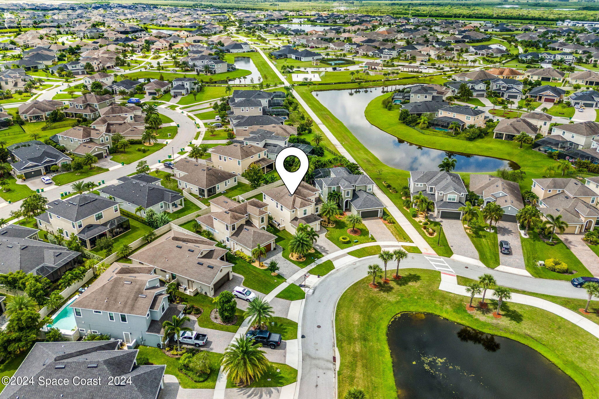 2850 Amethyst Way Melbourne, FL 32940 - Photo 31 of 37 an aerial view of residential houses with outdoor space