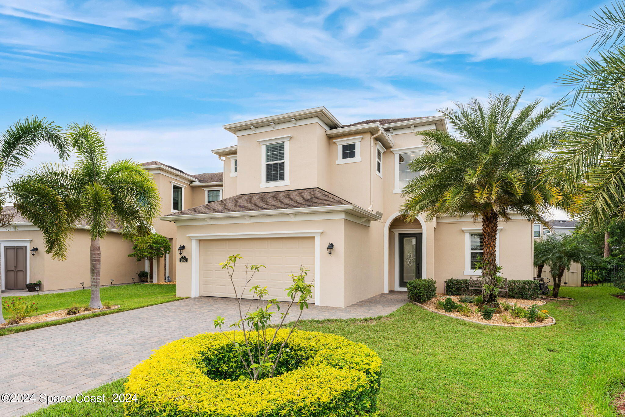 2850 Amethyst Way Melbourne, FL 32940 - Photo 33 of 37 a front view of house with yard and green space