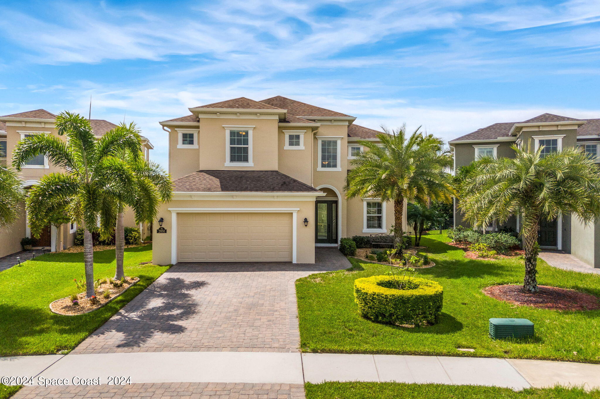 2850 Amethyst Way Melbourne, FL 32940 - Photo 34 of 37 a front view of a house with garden