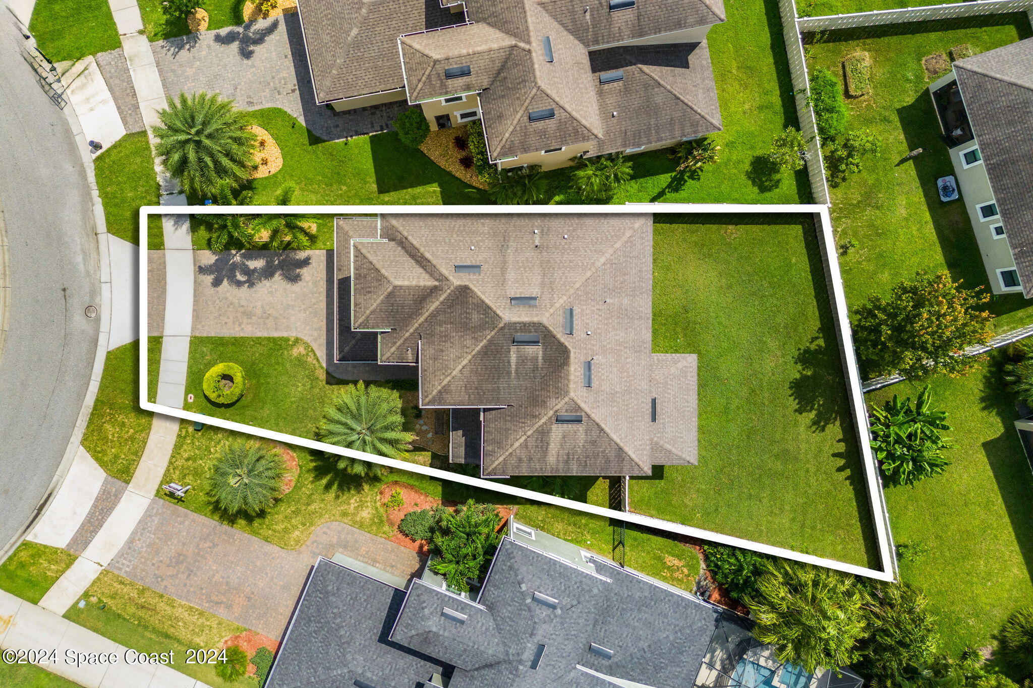 2850 Amethyst Way Melbourne, FL 32940 - Photo 36 of 37 an aerial view of a house with a garden
