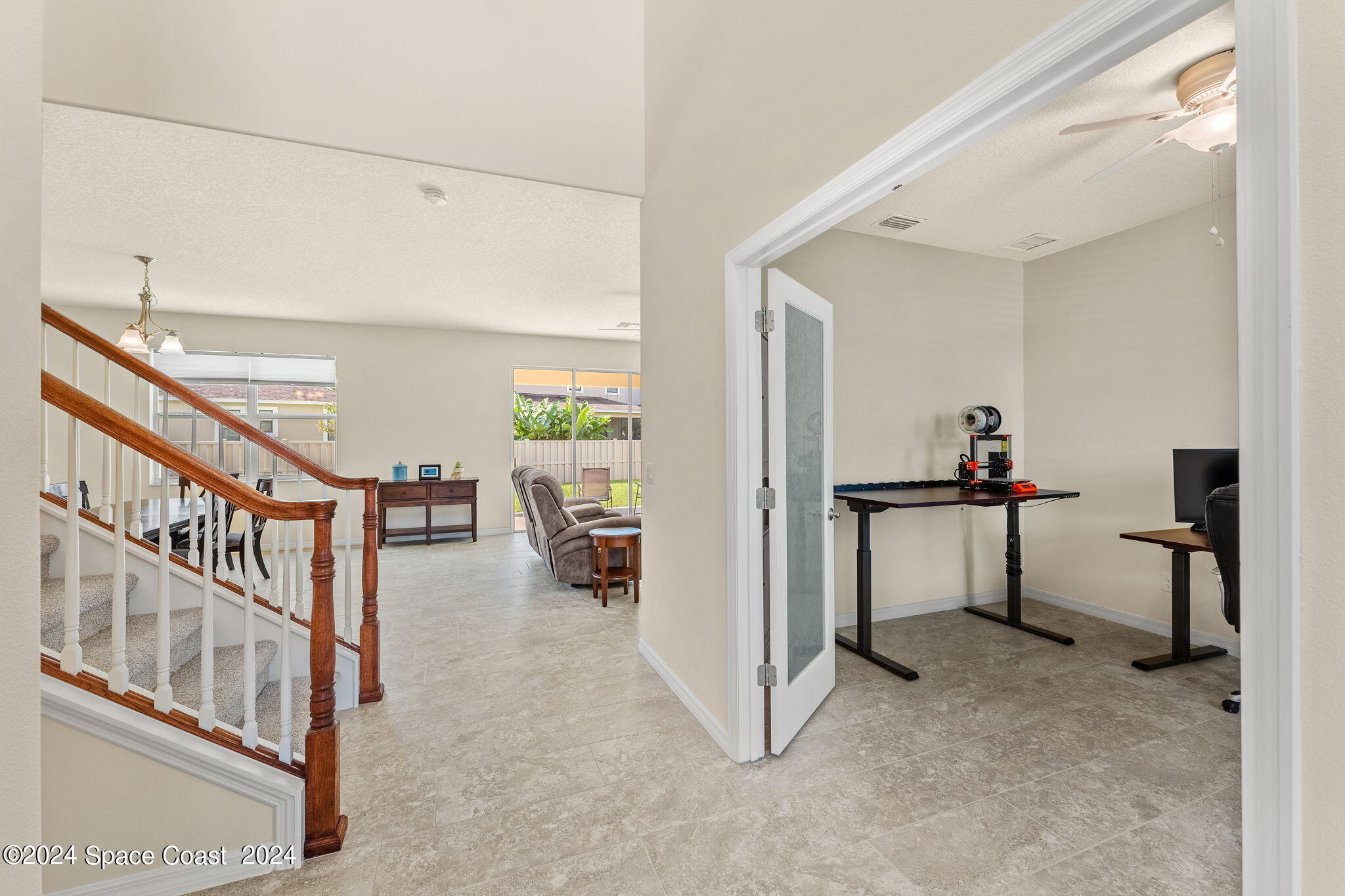 2850 Amethyst Way Melbourne, FL 32940 - Photo 6 of 37 a view of a livingroom with furniture and an entryway