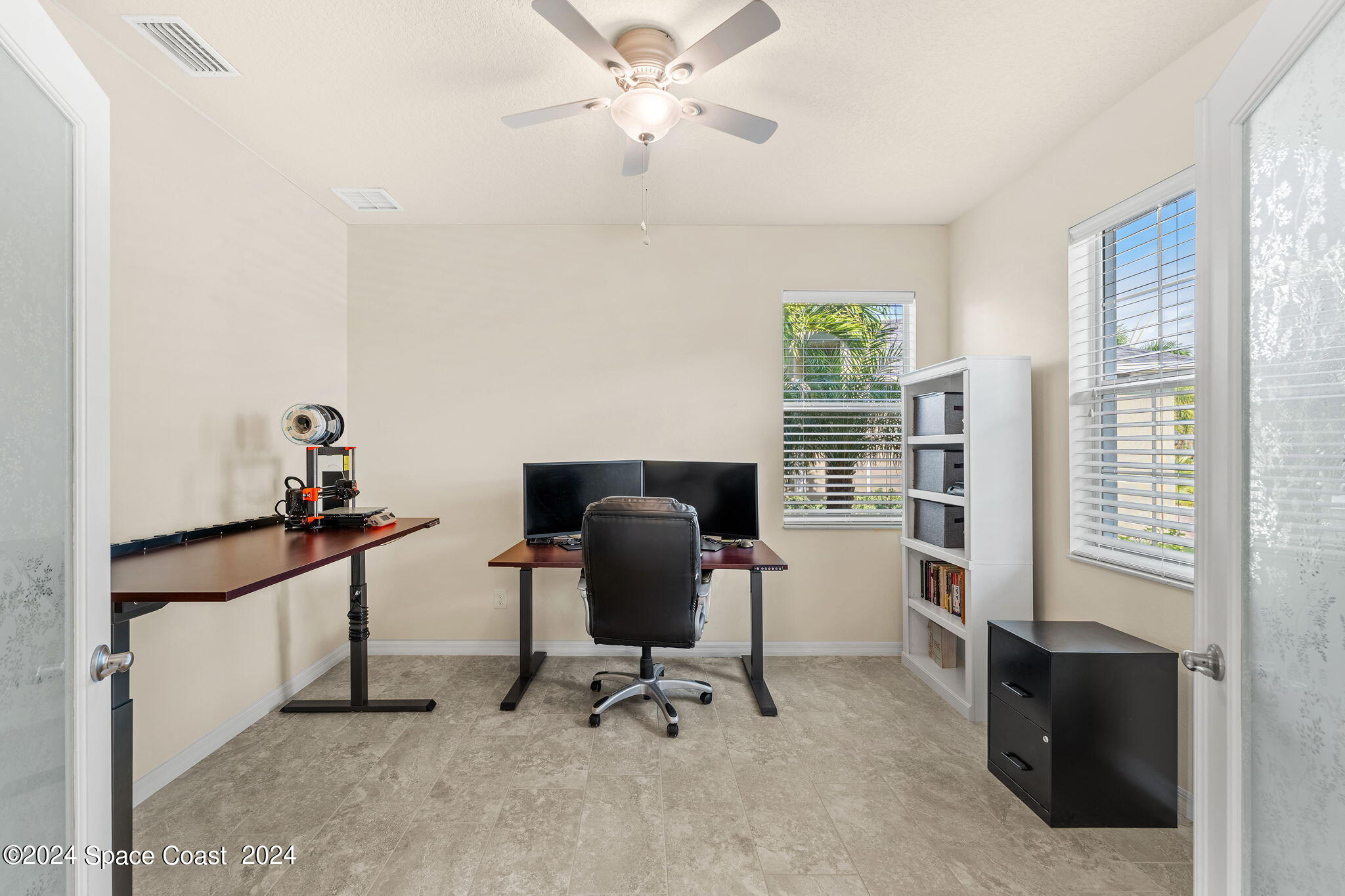 2850 Amethyst Way Melbourne, FL 32940 - Photo 7 of 37 a view of a workspace with furniture and a window