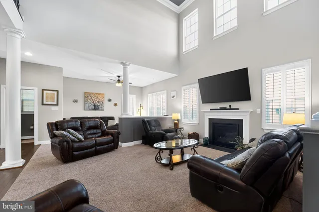 a large kitchen with a table and chairs