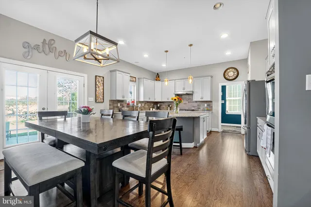 a kitchen with lots of counter top space and appliances