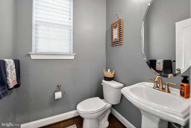 a bedroom with furniture and flat screen tv