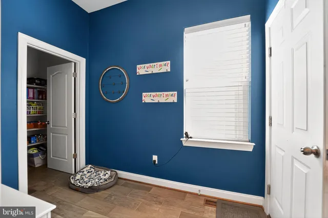 a large room with a lot of living room and furniture