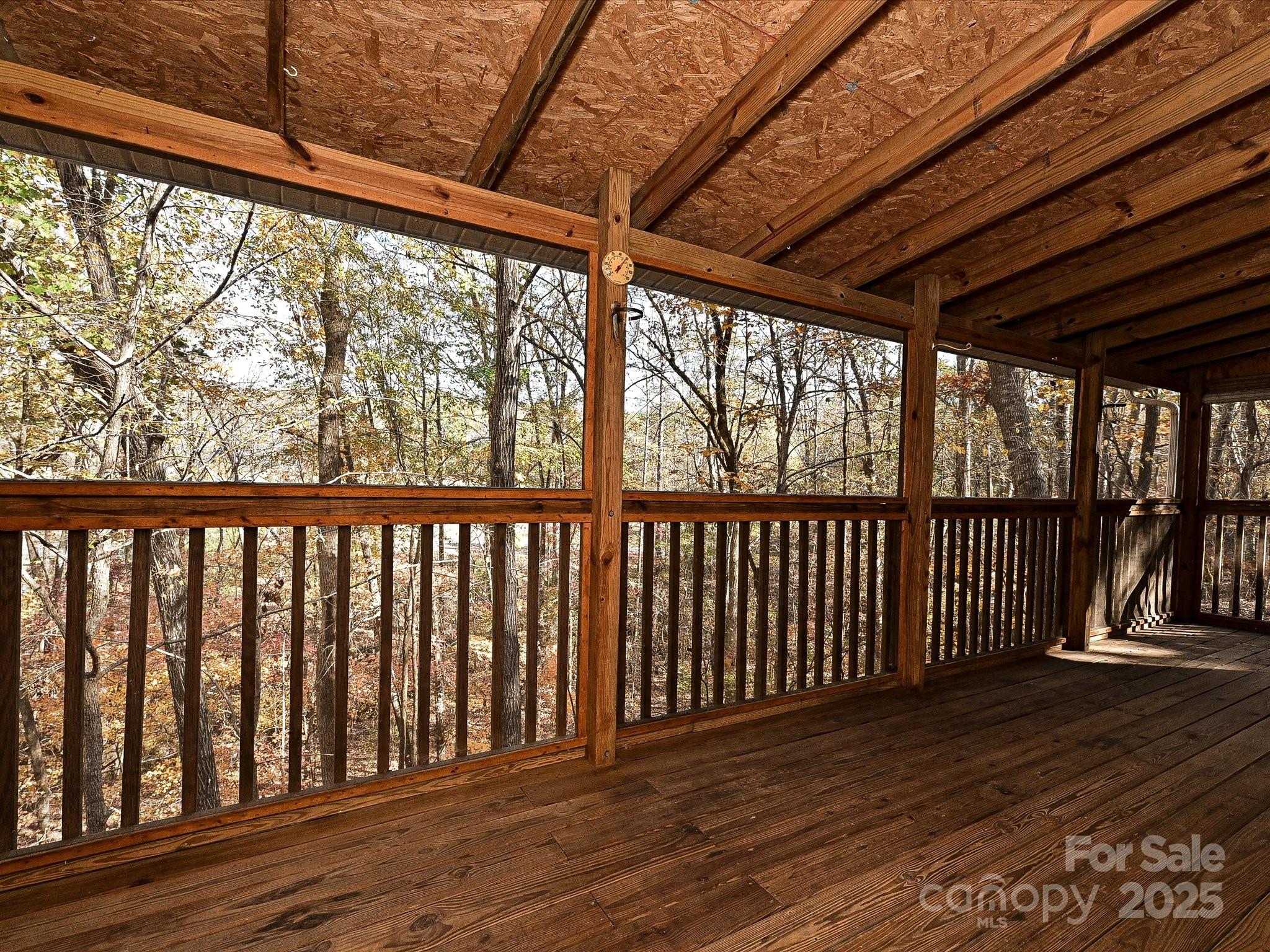 25040 Timberlake Drive Tega Cay, SC 29708 - Photo 16 of 40 a view of a porch with wooden floor