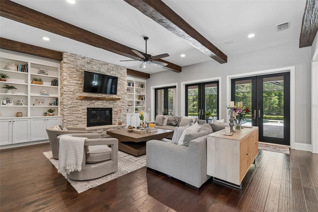 17001 Midas Lane Lutz, FL 33549 - Photo 11 of 100 a living room with fireplace furniture and a flat screen tv
