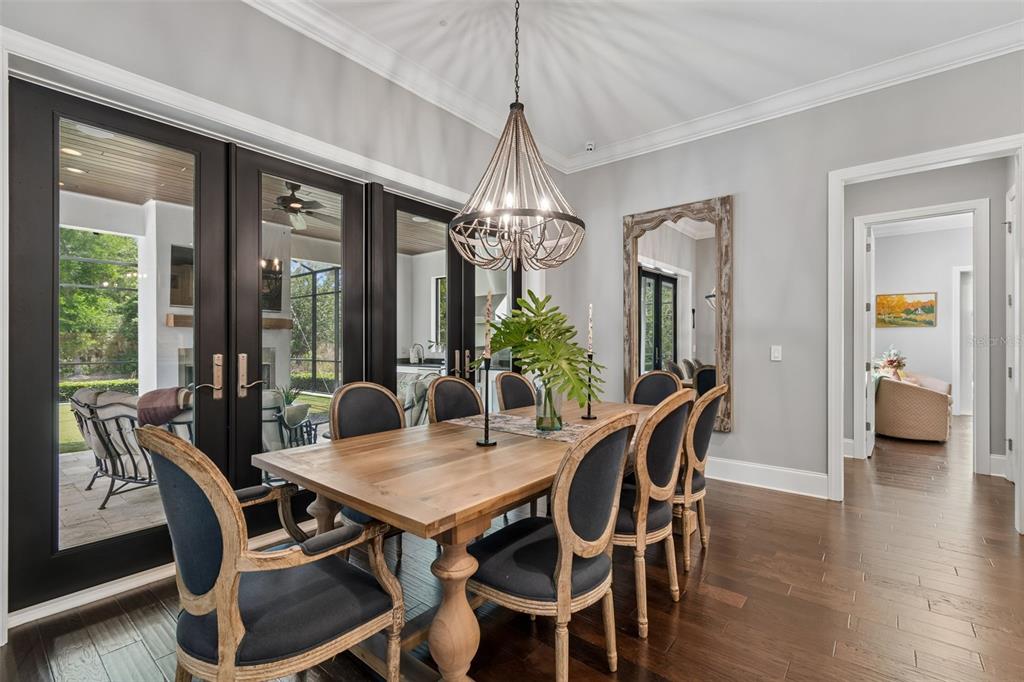 17001 Midas Lane Lutz, FL 33549 - Photo 16 of 100 a view of a dining room with furniture window and wooden floor