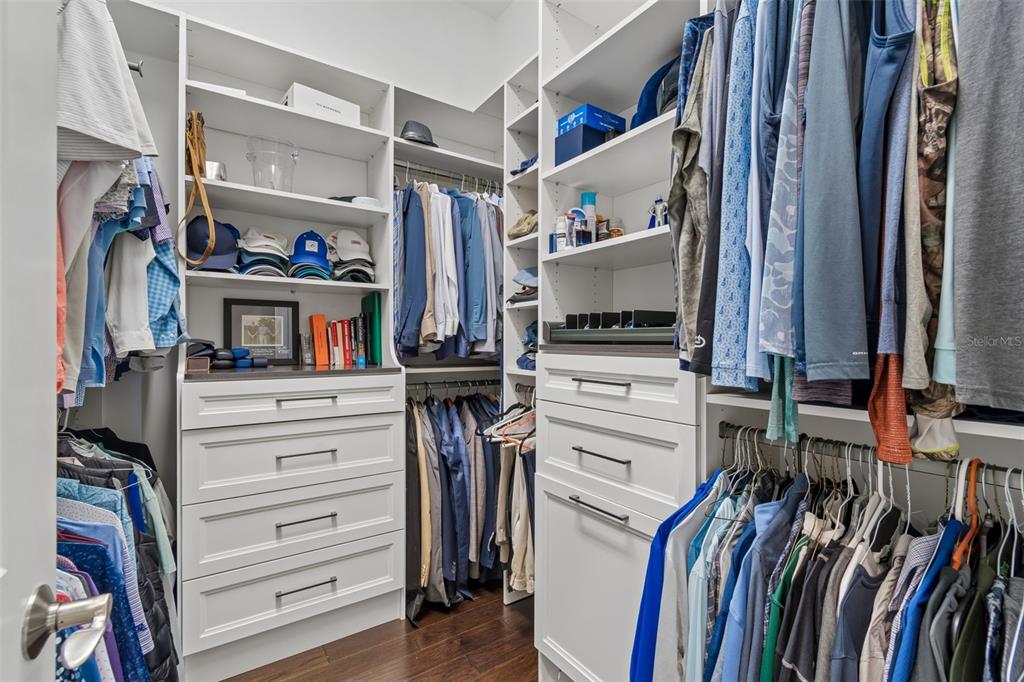 17001 Midas Lane Lutz, FL 33549 - Photo 41 of 100 a view of walk in closet with clothes and shoes