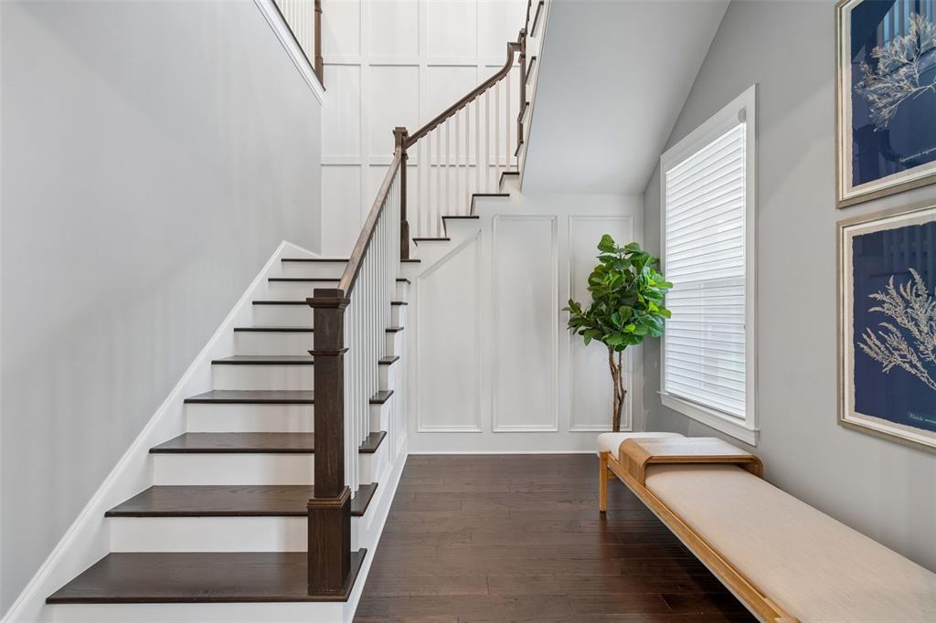 17001 Midas Lane Lutz, FL 33549 - Photo 50 of 100 a view of staircase with wooden floor and a potted plant