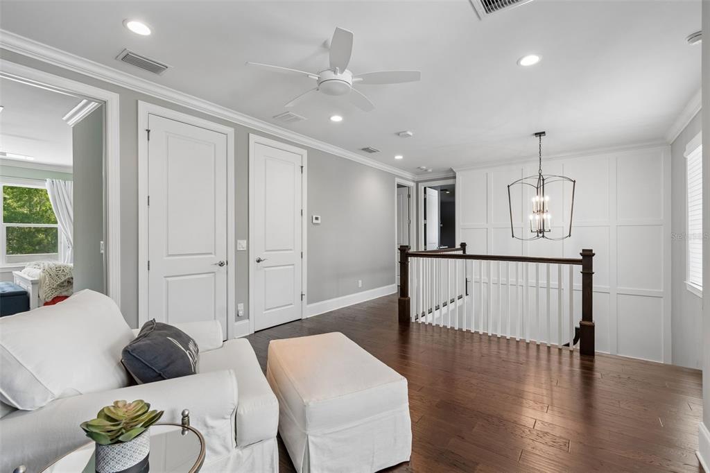 17001 Midas Lane Lutz, FL 33549 - Photo 52 of 100 a living room with furniture and a wooden floor