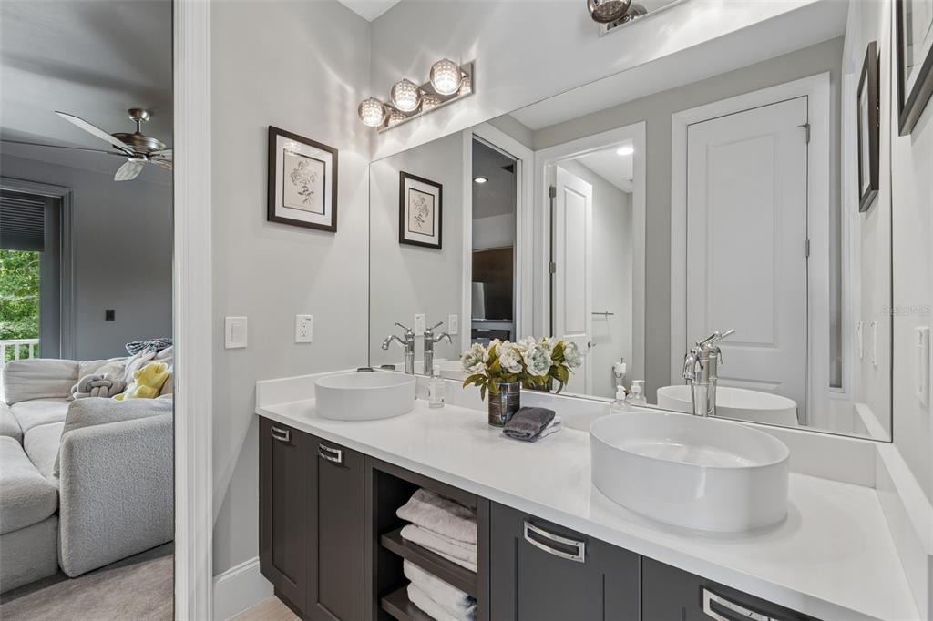 17001 Midas Lane Lutz, FL 33549 - Photo 66 of 100 a bathroom with a sink double vanity and a mirror
